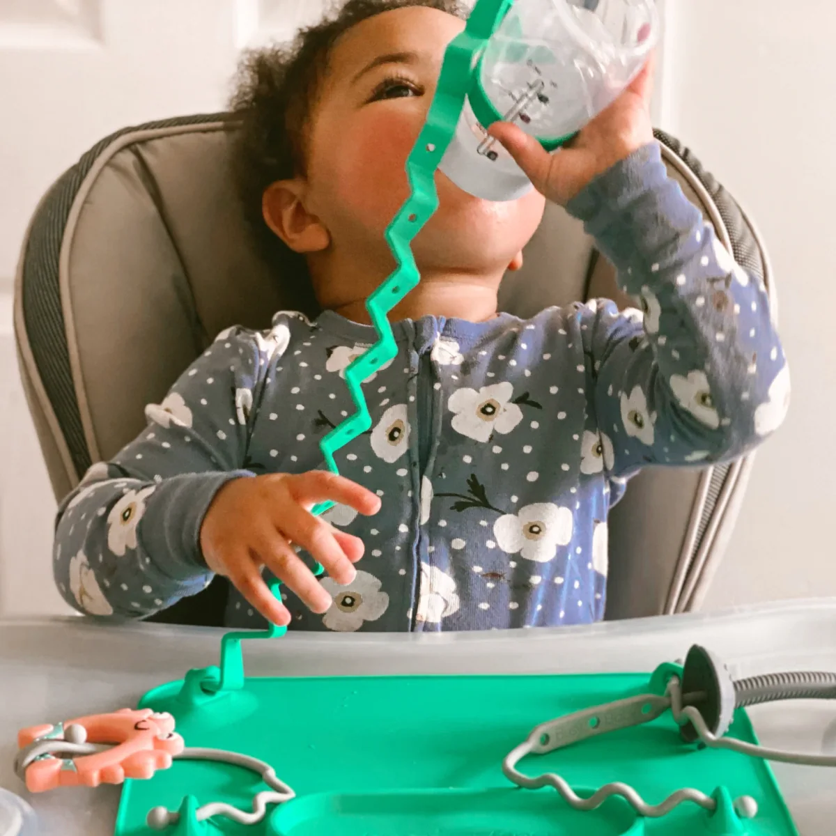 Busy Baby Mat tethered silicone placemat, associated with inventor Beth Benike
