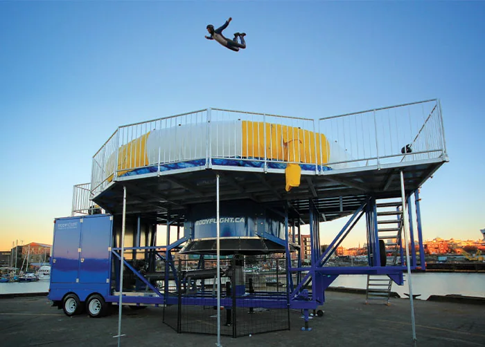Vertical wind-tunnel skydiving simulator, associated with inventor Bill Kitchen