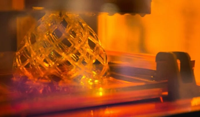 stereolithography (SLA) 3D printer, associated with inventor Charles Hull