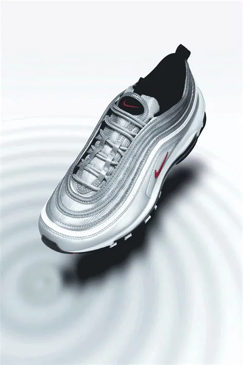 Nike Air Max 97, associated with inventor Christian Tresser