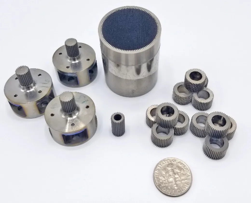 Bulk-metallic-glass precision gears and components, associated with inventor Douglas Hofmann