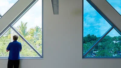 Electronically tintable glass, associated with inventor Jean-Christophe Giron