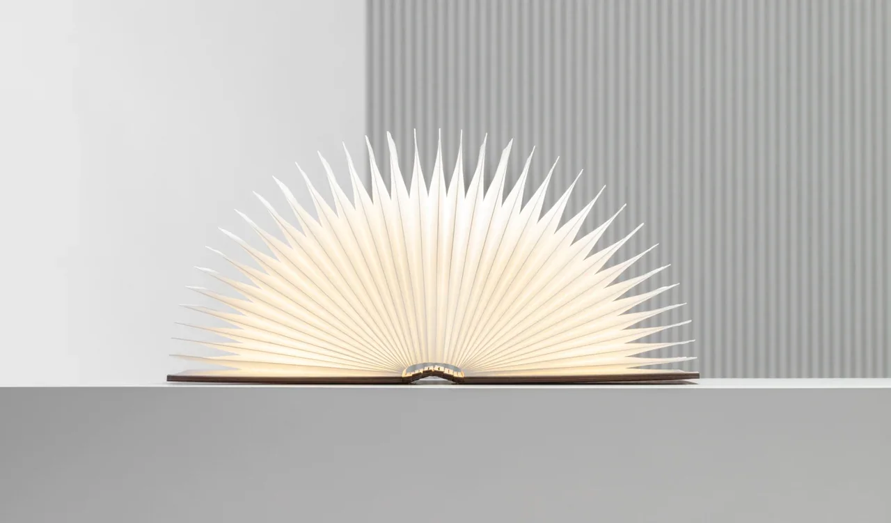 Lumio Original book-shaped LED lamp, associated with inventor Max Gunawan