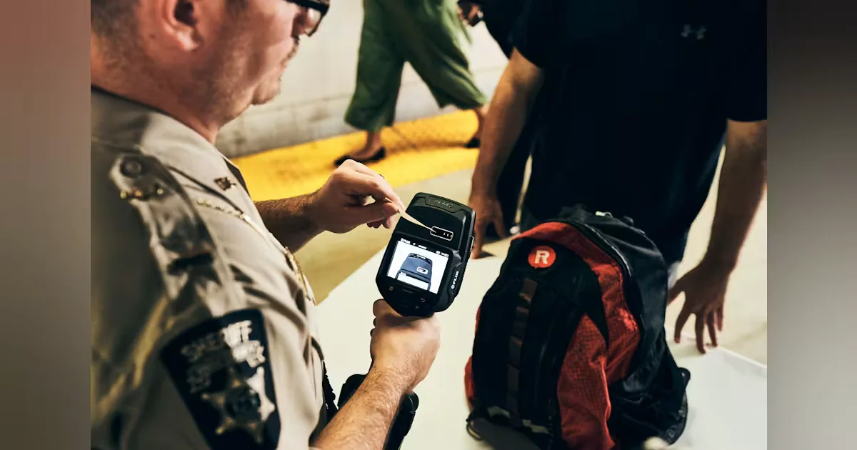 Fido handheld explosives detector, associated with inventor Timothy M. Swager