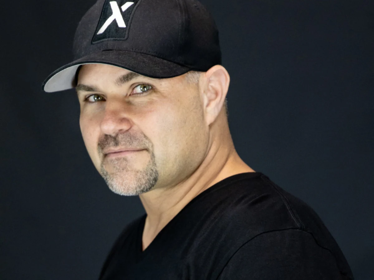 Joe Altieri wearing a black cap