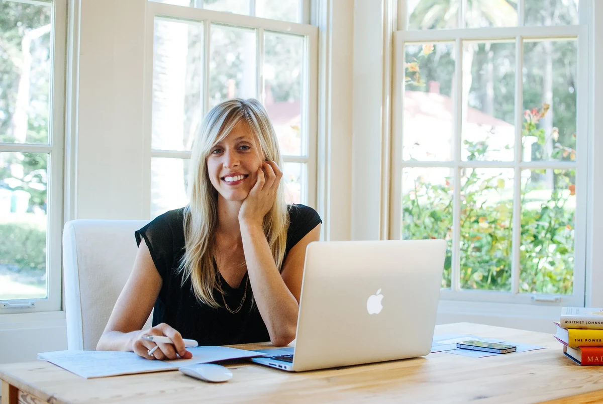 Katherine Krug seated at a desk